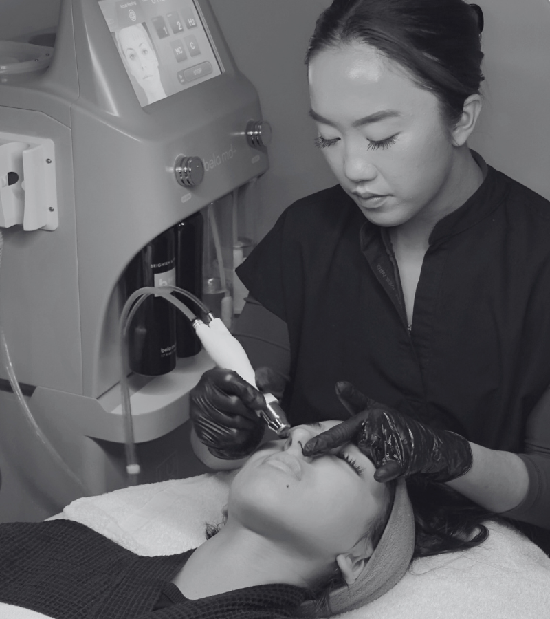 medical aesthetician performs BelaMD facial on client